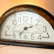 Junghans half moon quartz mantel clock front view