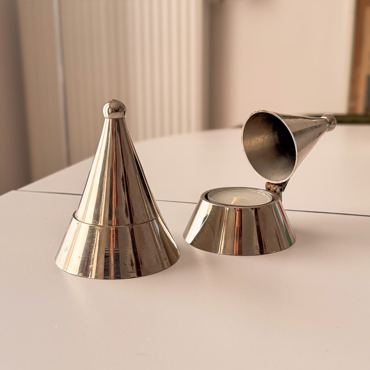 Matching pair of vintage Alessi La Conica silver tone cone tealight holders – photograph 2