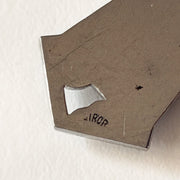 Close-up of the GIROR signature on reverse of pendant