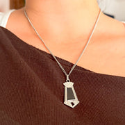 Signed GIROR Art Deco black onyx pendant worn on chain for scale; chain not included