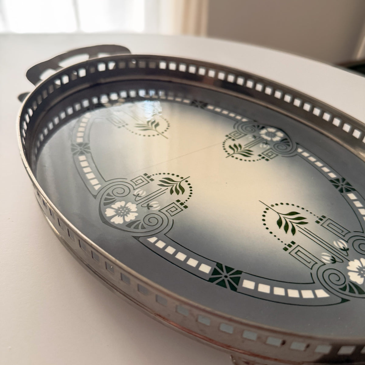 Pierced metal edge and handle of Max Dannhorn Art Nouveau tray