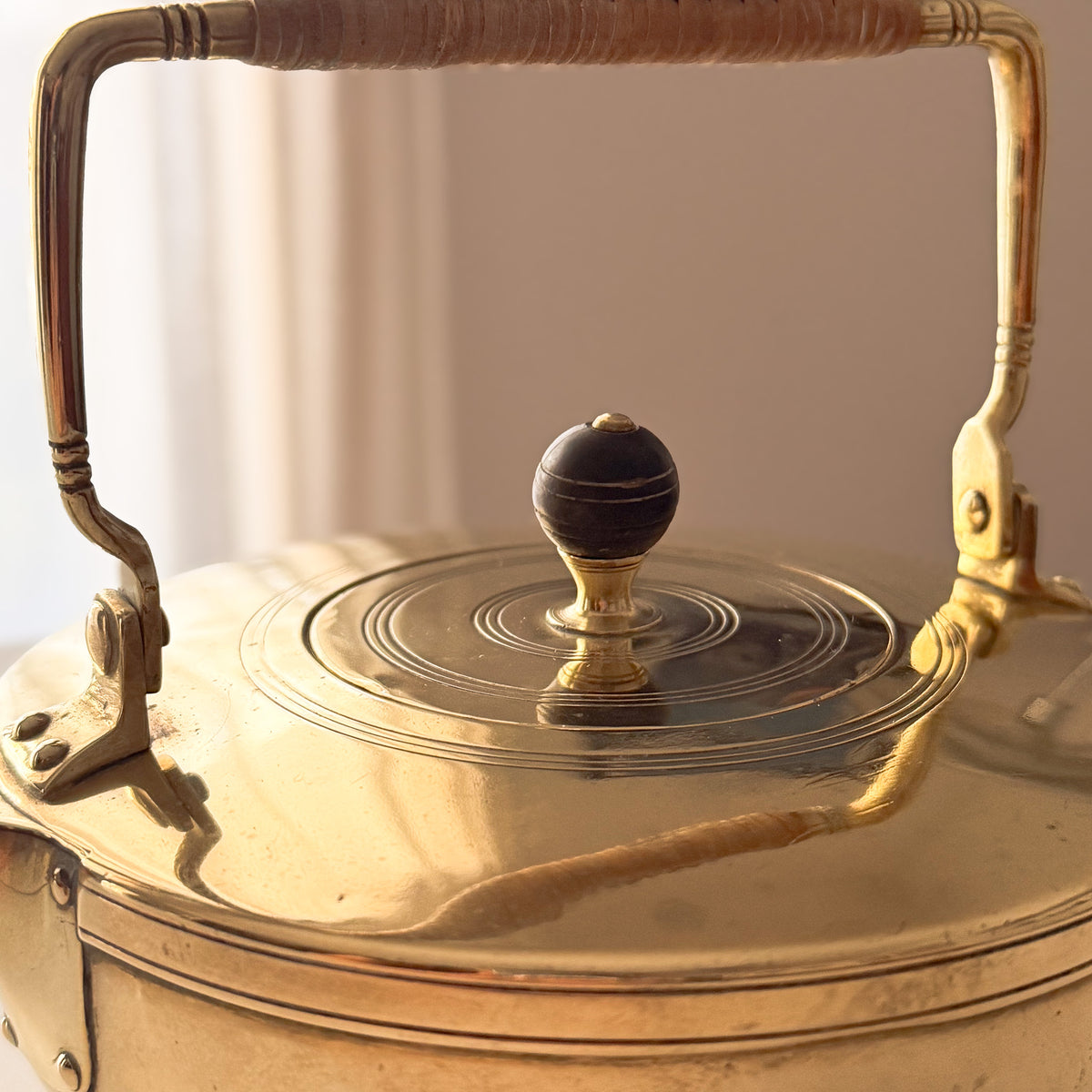 Monogram on antique Jan Eisenloeffel teapot near the spout