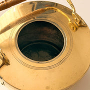 Interior wear and patina of early 1900s Jan Eisenloeffel brass teapot