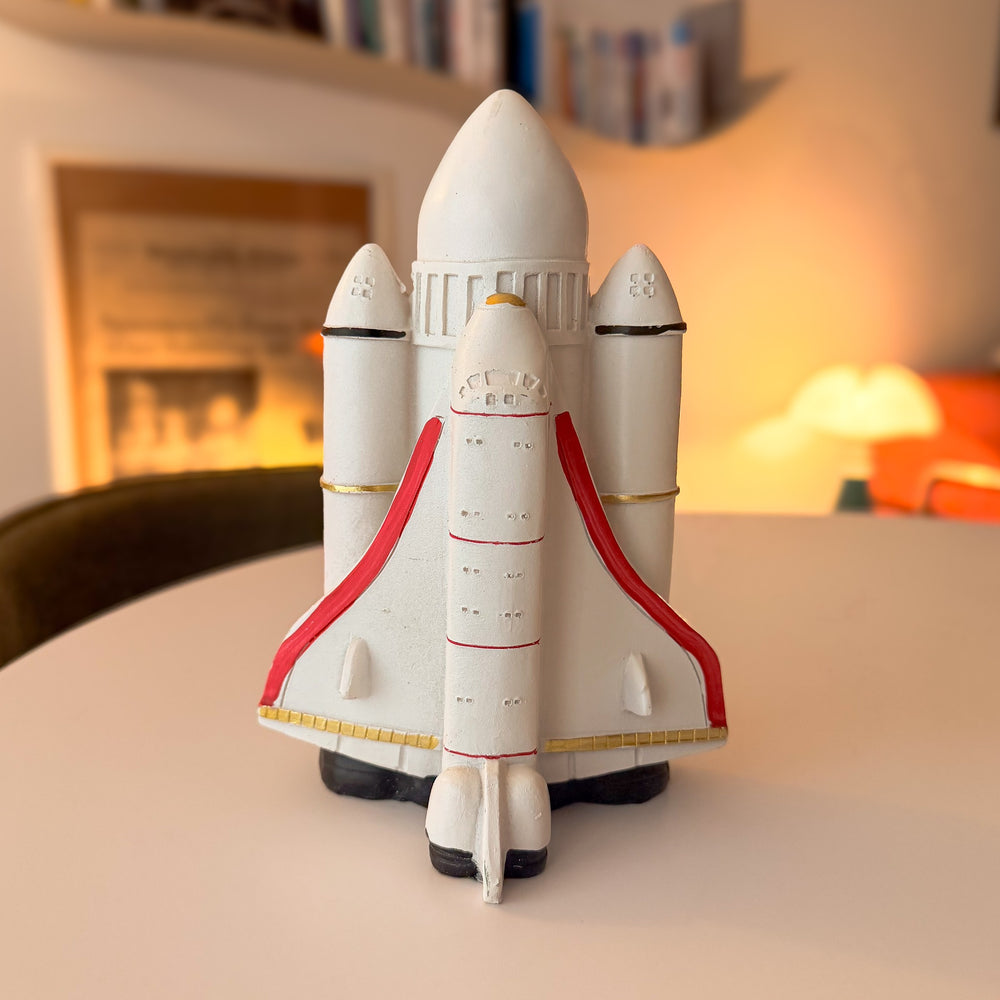Vintage Space Shuttle coin bank in painted resin, front view